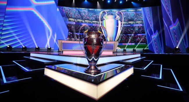 UEFA Champions League trophy displayed during the 2026/27 league-phase draw in Monaco.