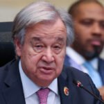 Farmers and traders handling agricultural produce as UN warns that deteriorating soils and erosion are threatening global food supplies.