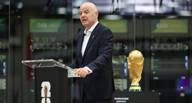 Gianni Infantino speaking at a FIFA event during the 2026 World Cup in Dallas.