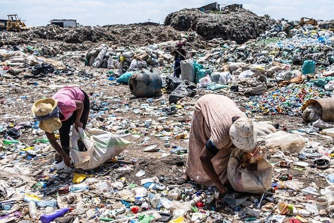 LAGESC officials rescue four nursing mothers and their babies from an illegal dumpsite in Agboju, Lagos.
