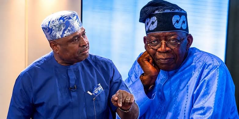 Kenneth Okonkwo and President Bola Tinubu during a discussion on Nigeria’s fuel subsidy removal and economic challenges.