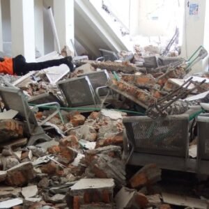 Rescuers search through rubble after a 7.7-magnitude earthquake struck Maumere on Indonesia’s Flores Island.
