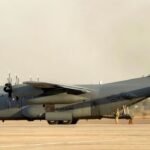 US Air Force C-130 Hercules military transport aircraft prepares to take off from Camp Victory near Baghdad International Airport.
