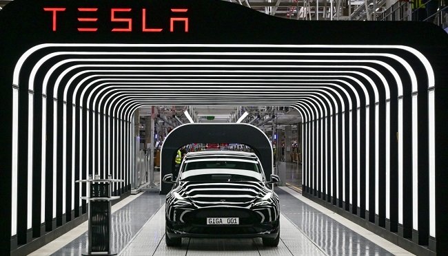 Tesla Cybercab self-driving robotaxi showcased for launch in Austin, Texas.