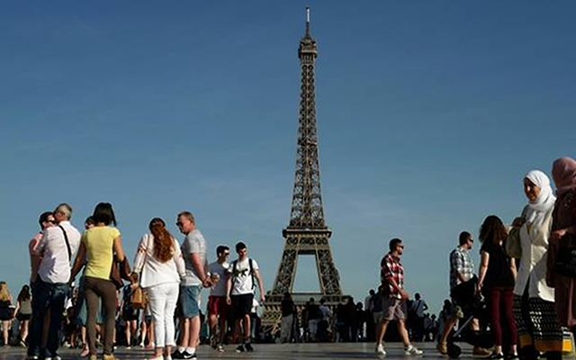 Eiffel Tower in Paris, France, after reopening following a staff strike over the removal of women employees during a religious group visit.