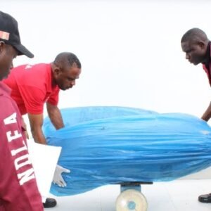 Nigerian Navy and NDLEA personnel during an operation involving the seizure of 71kg of suspected cannabis on the River Niger in Kogi State.