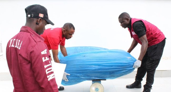 Nigerian Navy and NDLEA personnel during an operation involving the seizure of 71kg of suspected cannabis on the River Niger in Kogi State.