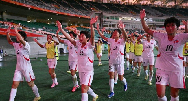 North Korean and South Korean women’s football players during their 1-1 Asian Games match in Shizuoka, Japan.