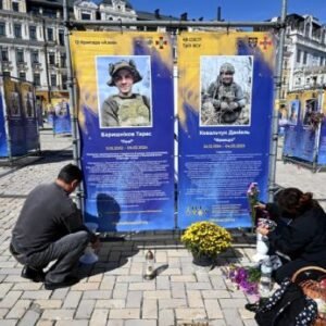 Ukrainian officials receive repatriated bodies returned from Russia in a war dead exchange.