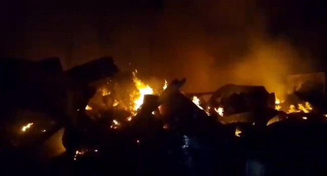 Fire burning a section of Sokoto Central Market as firefighters work to contain the blaze.