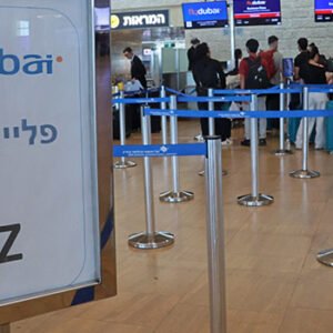 Passengers at Ben Gurion Airport following the emergency diversion of a flydubai flight after an alleged cockpit attack.