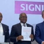 Aliko Dangote and business leaders at the Dangote Refinery IPO signing ceremony in Lagos on September 7, 2026.