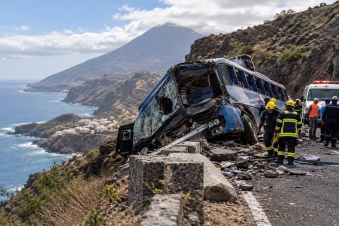 Rescue workers at the site of a fatal bus crash on Fogo Island, Cabo Verde, where 25 people were killed.