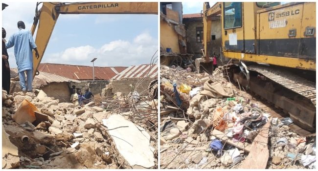 Rescue workers and an excavator at the scene of a collapsed building in Popo Giwa, Ilorin, Kwara State.