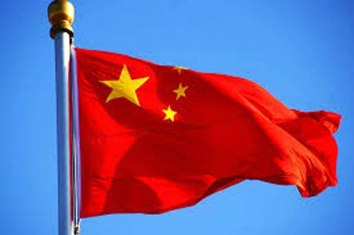 Chinese flag displayed in Shanghai amid reports of satellite imagery allegedly supplied to Iran.