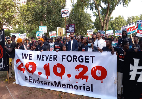 Police officers fire tear gas to disperse activists commemorating the sixth anniversary of the #EndSARS protests at Lekki Toll Gate in Lagos.