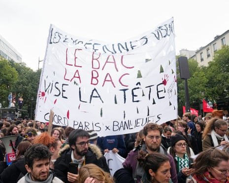 Protesters march during a demonstration in Paris, France, on October 6, 2026, amid nationwide protests over rising living costs and learning conditions.