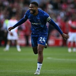 Chelsea captain Reece James celebrates during a Premier League match against Nottingham Forest at the City Ground in May 2025.