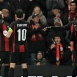Bournemouth players celebrate during their 3-0 Europa League victory over 10-man AC Milan at the Vitality Stadium on 22 October 2026.