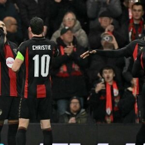 Bournemouth players celebrate during their 3-0 Europa League victory over 10-man AC Milan at the Vitality Stadium on 22 October 2026.