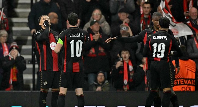 Bournemouth players celebrate during their 3-0 Europa League victory over 10-man AC Milan at the Vitality Stadium on 22 October 2026.