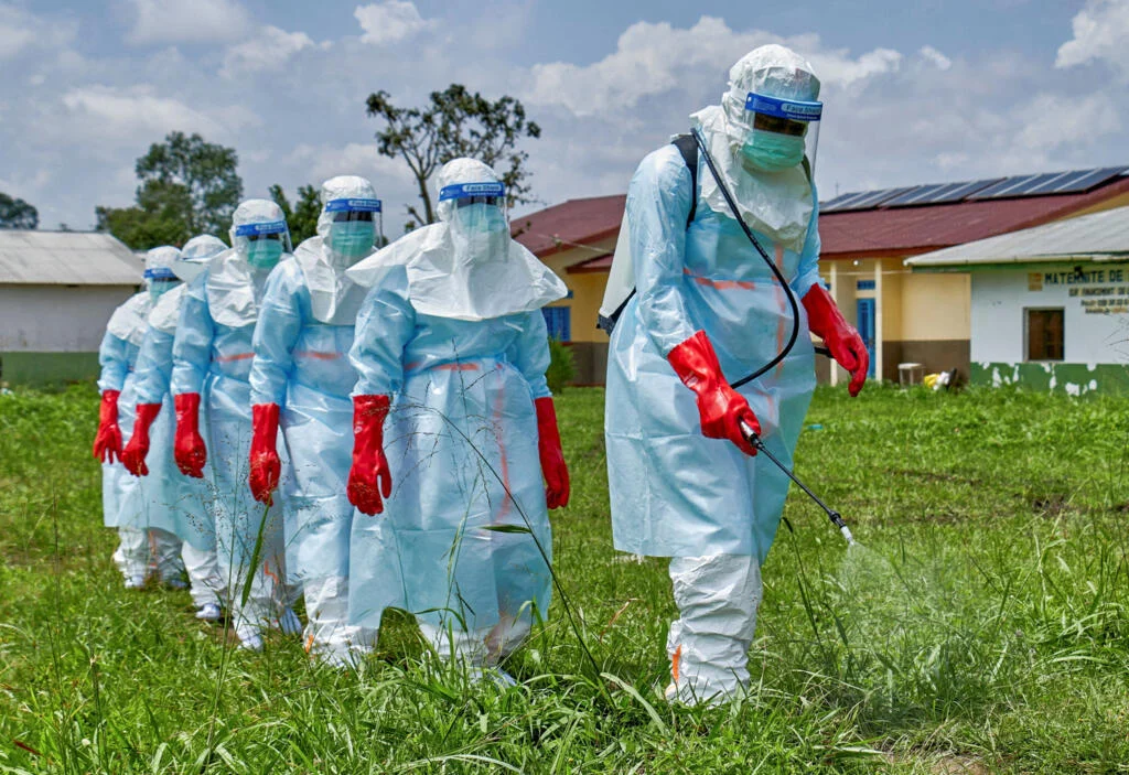 Health workers wearing protective equipment as Nigeria intensifies its response to the Ebola outbreak in Abuja.