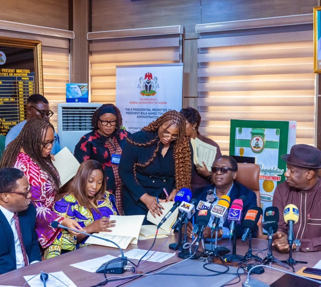 Federal Aviation Minister Festus Keyamo and Bi-Courtney chairman Wale Babalakin at the signing of an agreement to resolve the Lagos airport management dispute.