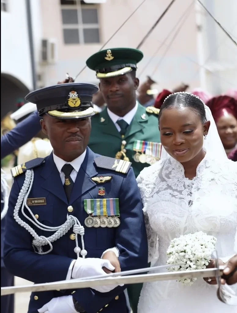 Nigerian Air Force pilot Ahamefule Man-Ugwueje and his wife Damilola Adekunle at their Abuja wedding on September 19, 2026