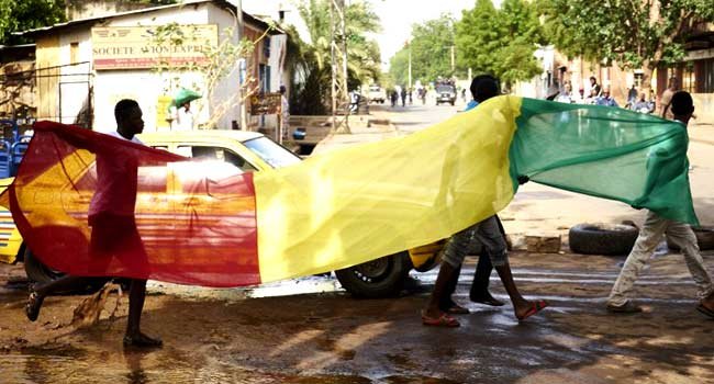 Civilians in Mali amid ongoing insecurity and violence in the country.