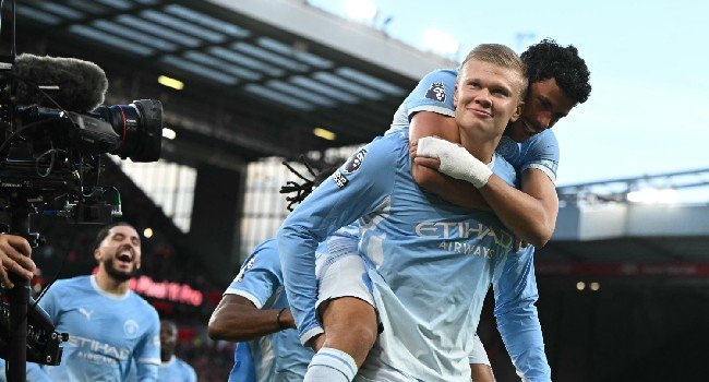 Manchester City's Erling Haaland celebrates with Matheus Nunes during the 3-0 Premier League victory over Liverpool at Anfield on 11 October 2026.