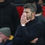 Michael Carrick gestures on the touchline during Manchester United's 3-0 Premier League defeat to Bournemouth at Old Trafford on October 25, 2026.