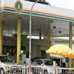 Petrol pump at a filling station illustrating the Federal Government's 30-day discount on NNPC petrol and proposed ₦1,350 per litre cost ceiling.