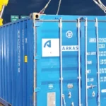Two overturned container trucks at Mile 2 near Freeman Market, Lagos, following a crash that killed a mother and her child.