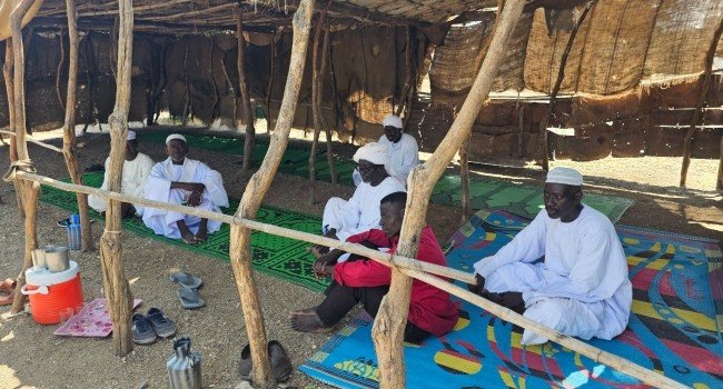 Residents inspect an airstrike site in Sudan as drone attacks kill more than 100 people amid intensifying conflict between the Sudanese military and the Rapid Support Forces.