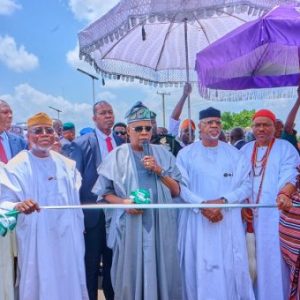Governor Lucky Aiyedatiwa speaking during the commissioning of the Reuben Fasoranti Flyover in Akure attended by Vice President Kashim Shettima.