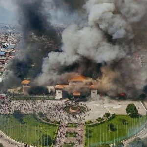 Protesters set Nepal parliament on fire