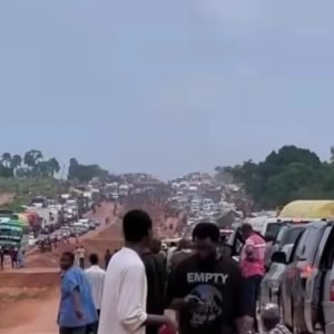 Vehicles stuck in heavy traffic on the Abuja-Kano highway amid roadworks and rainfall during Eid-el-Kabir.