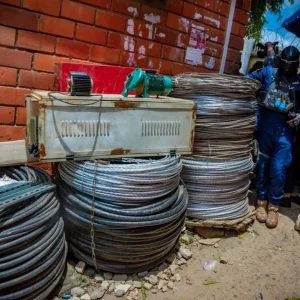 NSCDC operatives display recovered electricity cables allegedly stolen by a former AEDC worker in Abuja.