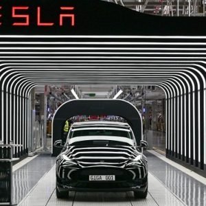 Tesla Cybercab self-driving robotaxi showcased for launch in Austin, Texas.