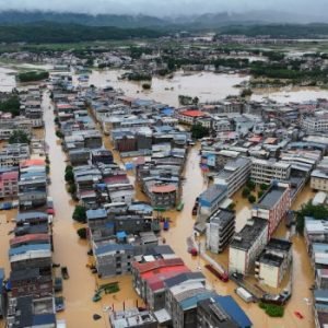 Rescue teams respond after deadly storms and flooding caused widespread destruction in central and southern China.