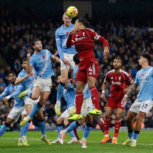 Man City ease past Liverpool to go second