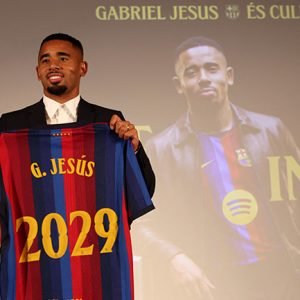 Gabriel Jesus poses with his Barcelona jersey during his official presentation in Barcelona.