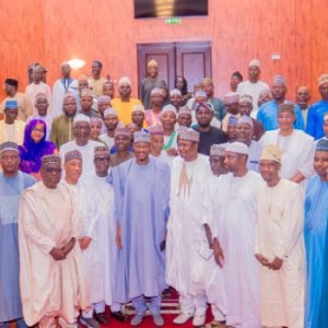 Governor Dikko Radda receiving PDP and ADC defectors into the APC at the Katsina Government House