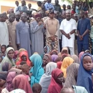 Recently rescued abductees gather with relatives and community members in Ngoshe, Borno State, after being freed from a terrorist enclave in the Mandara Mountains.