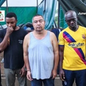 NDLEA officials display suspects and recovered equipment after uncovering an industrial-scale methamphetamine laboratory in Oyo State.