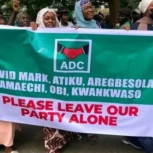 Supporters of David Mark-led ADC leadership protesting outside the Federal High Court in Abuja during the party's ongoing leadership dispute.