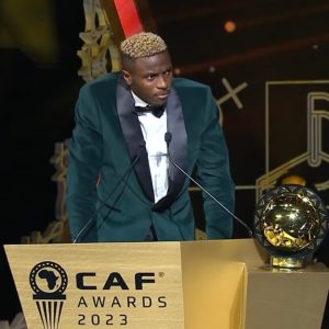 Victor Osimhen receiving his 2023 CAF men's player of the year award