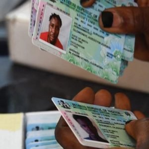 INEC Permanent Voter Cards laid out during distribution exercise ahead of Ekiti State governorship election, showing organised voter registration process.