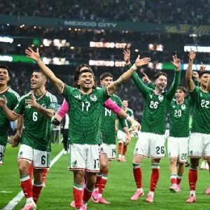 Mexico players celebrate after defeating Ecuador 2-0 in their FIFA World Cup 2026 round of 32 match at the Azteca Stadium.