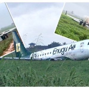 Enugu Air aircraft after skidding off the runway at Benin Airport as emergency responders secure the scene.